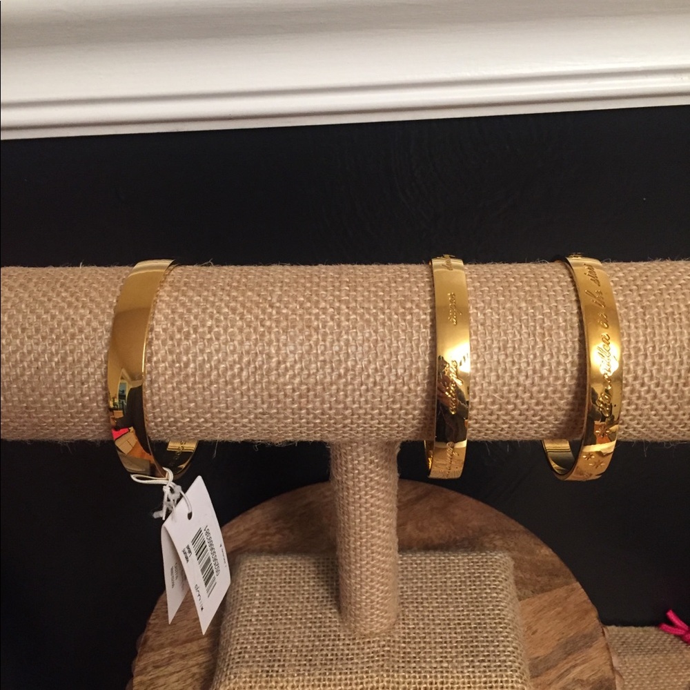 Kate Spade three gold tone bracelets